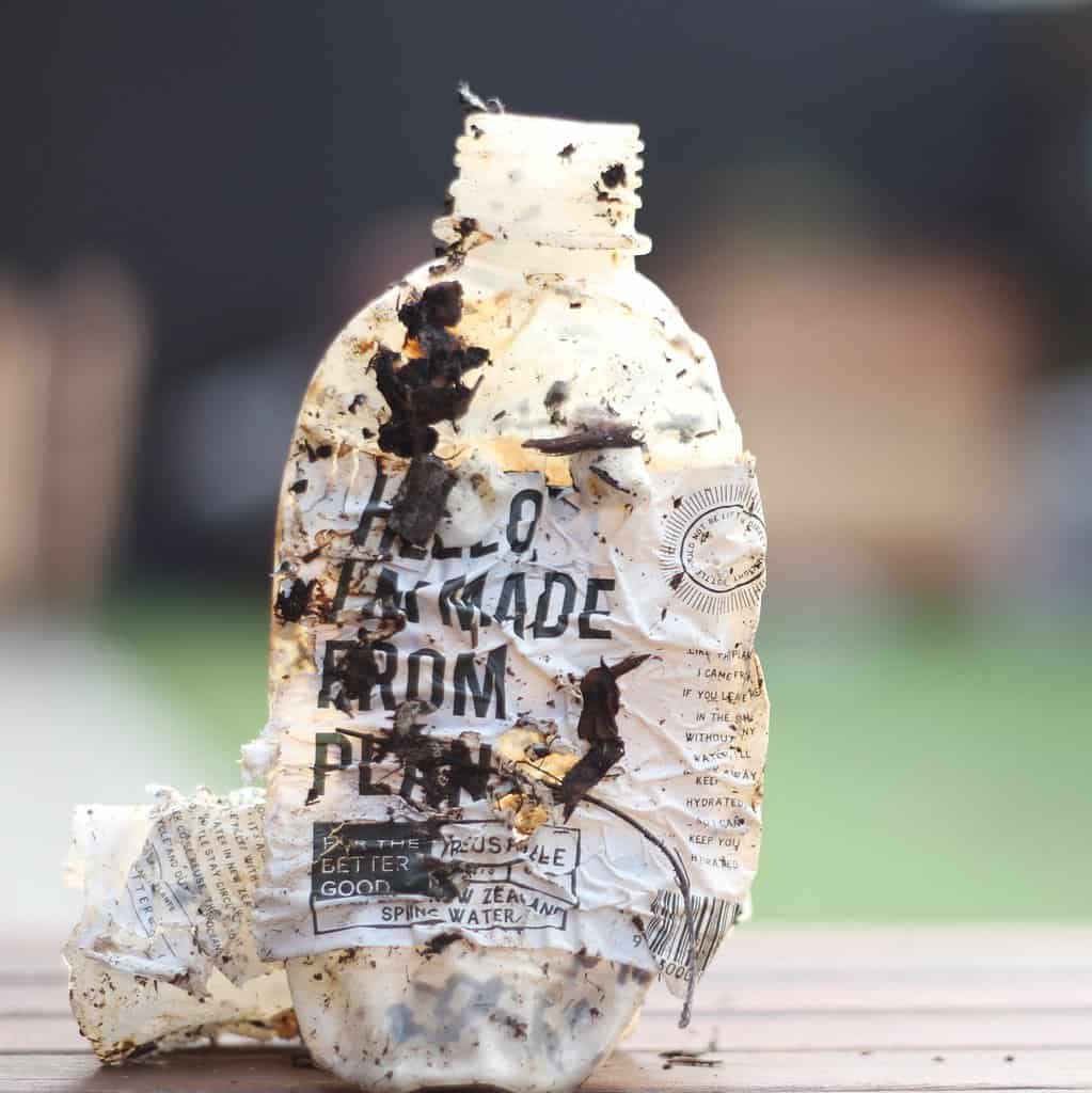 photo of For The Better Good compostable bottle mid way through decomposing