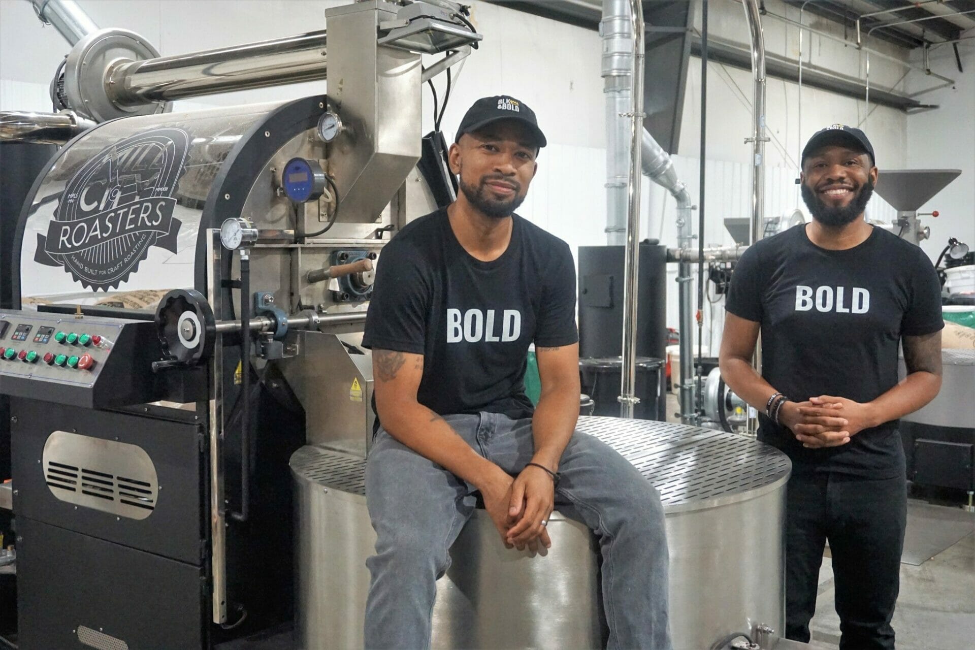 Pernell Cezar (left) and Rod Johnson at one of their coffee roasters.
