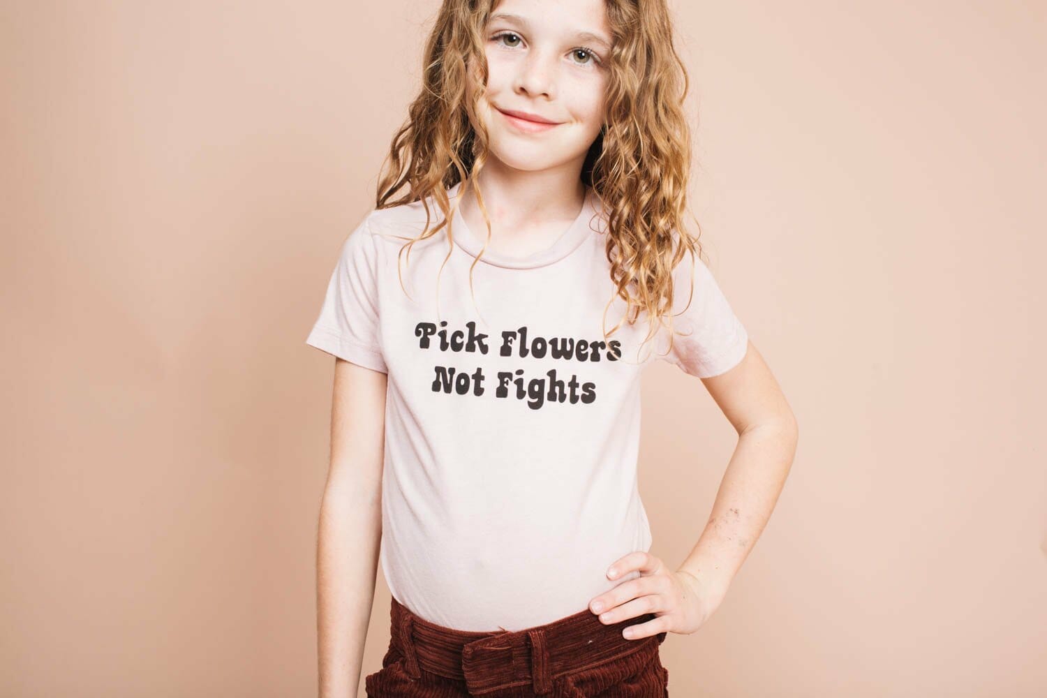 Girls wearing a t-shirt that reads