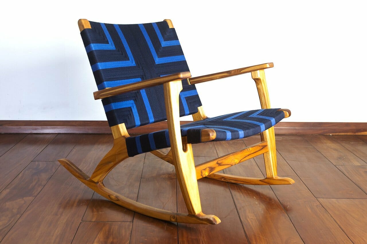 Wooden rocking chair with woven seat