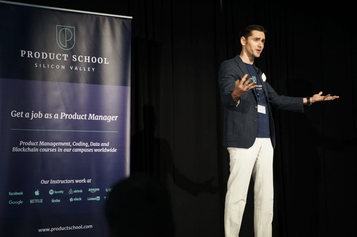 A man delivering a marketing presentation on an ecommerce stage.