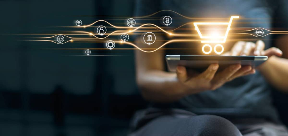 A successful woman using a tablet as an ecommerce tool.