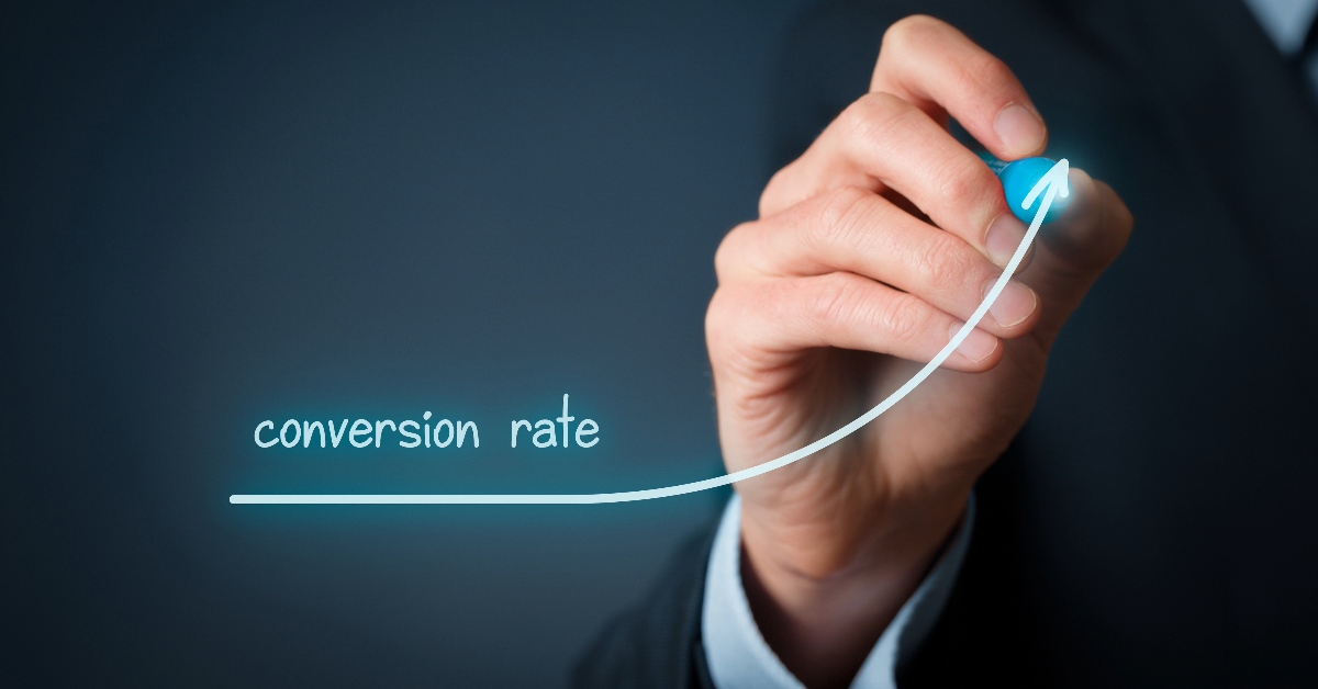 A hand draws an upward-pointing graph arrow labeled "conversion rate" against a dark background, highlighting the impact of augmented reality in e-commerce.
