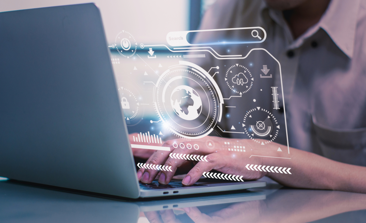 A woman is using a laptop with a AI image on it to boost security on digital platforms.