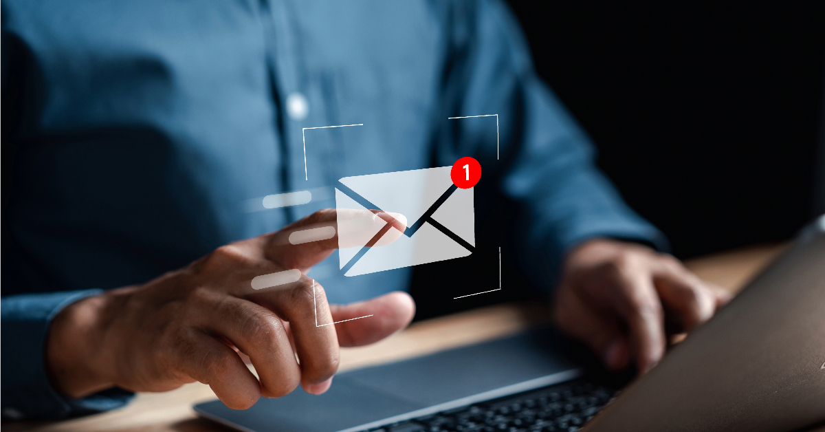 A person interacts with a virtual email icon on a touchscreen device, indicating one new message notification, likely tied to an engaging email marketing campaign.