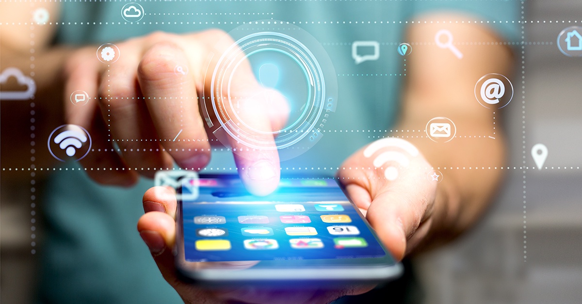 A modern user interacts with a smartphone, surrounded by digital icons representing various applications and online services, creating a seamless digital experience.