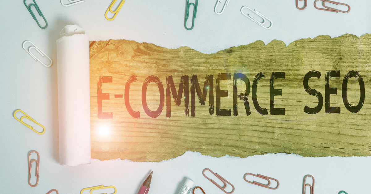 A piece of paper with the words "ecommerce" and "SEO" written on it.