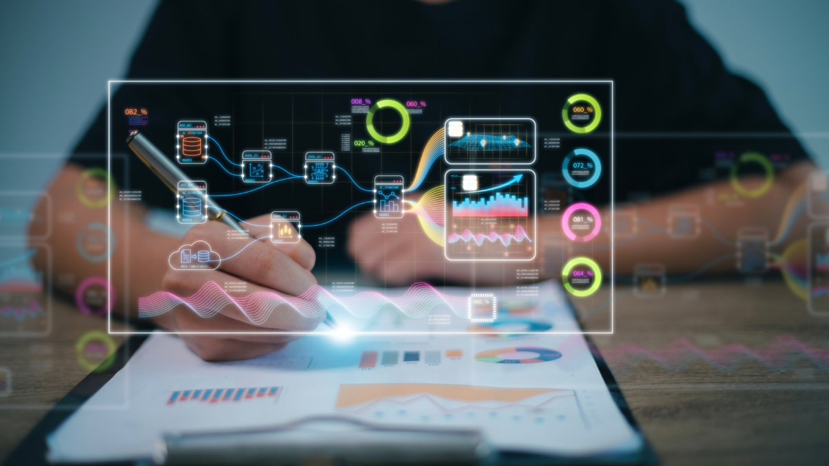A man is meticulously jotting down a brilliant growth marketing strategy on a piece of paper, diligently incorporating key graphs to ensure success.