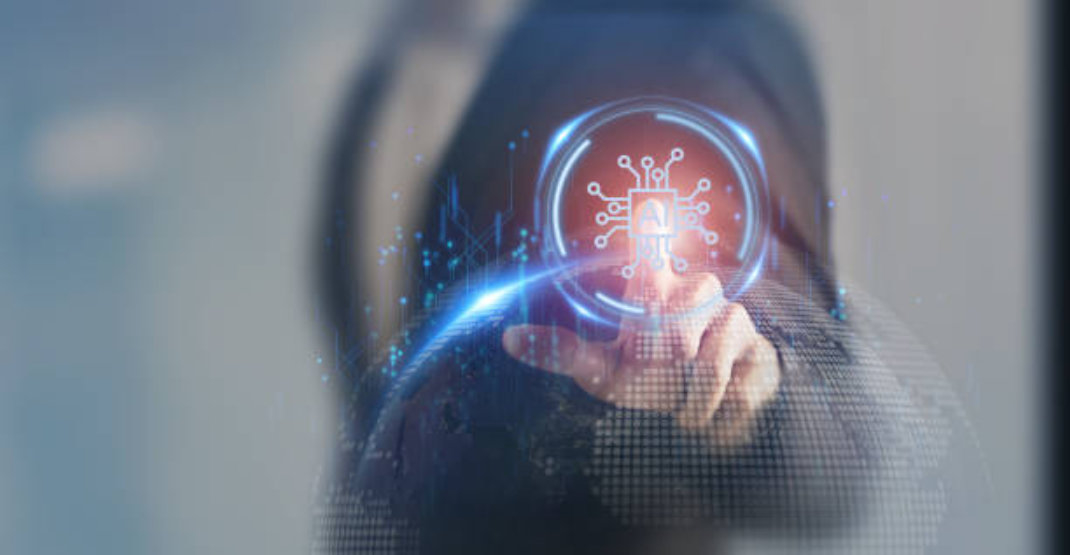 A person in a suit is touching a digital representation of a secure microchip, symbolizing cybersecurity or advanced technology. Blue light effects surround the microchip, enhancing the futuristic theme—a striking image emblematic of fintech innovation in the financial services sector.