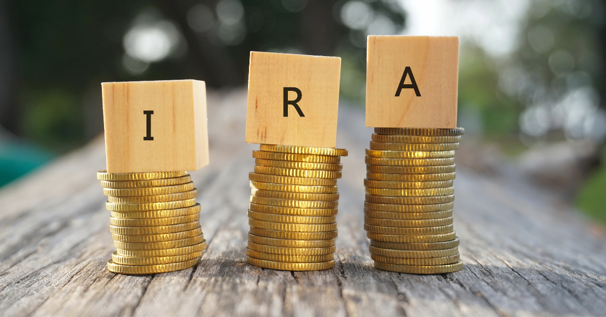 Three stacks of wooden blocks with the word ira on them, representing a potential money trail.