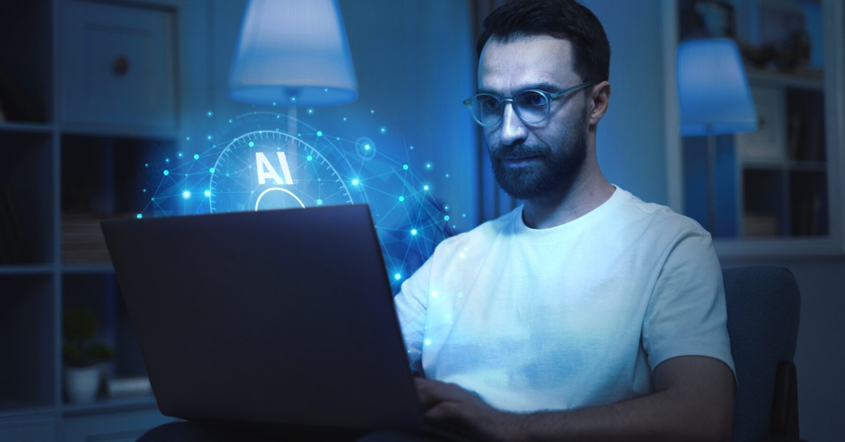 A person with glasses is using a laptop, surrounded by a digital AI hologram. Seated indoors with bookshelves and lamps in the background, they delve into ecommerce strategies, exploring Shopify to boost their DTC brand.