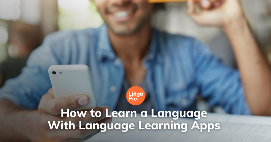 A person holds a smartphone and smiles, with text overlay: "Master Language Learning Through Innovative Apps.