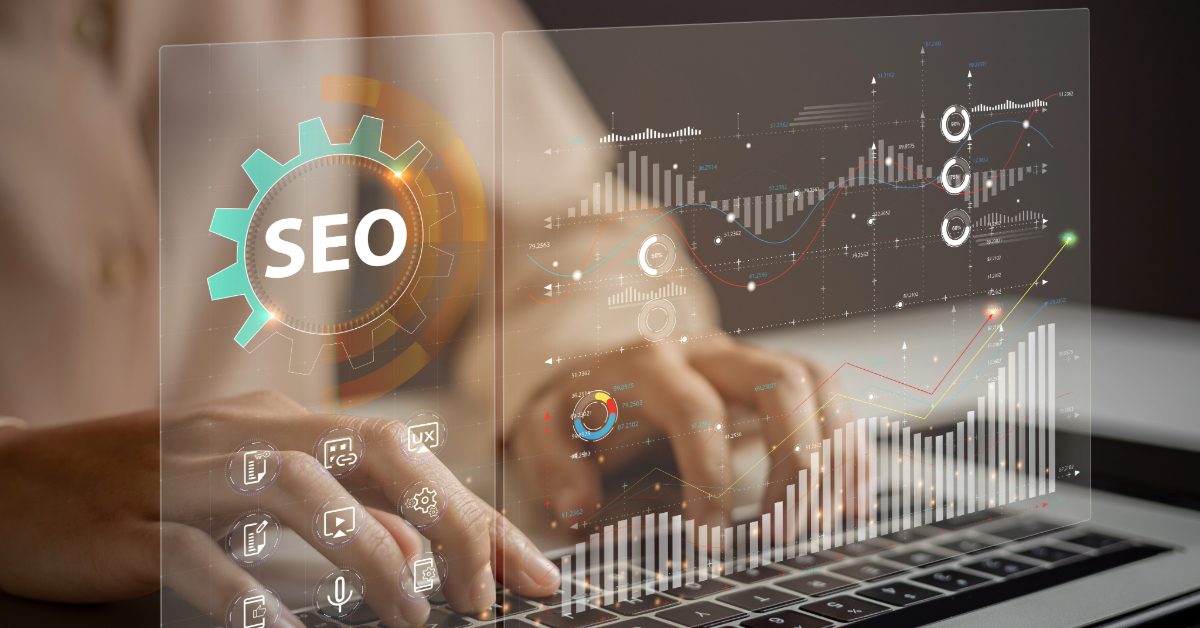 A person is typing on a laptop, where digital charts, graphs, and an SEO gear icon hover above the keyboard. The transparent screen illustrates enhanced SEO strategies that drive success with precision.
