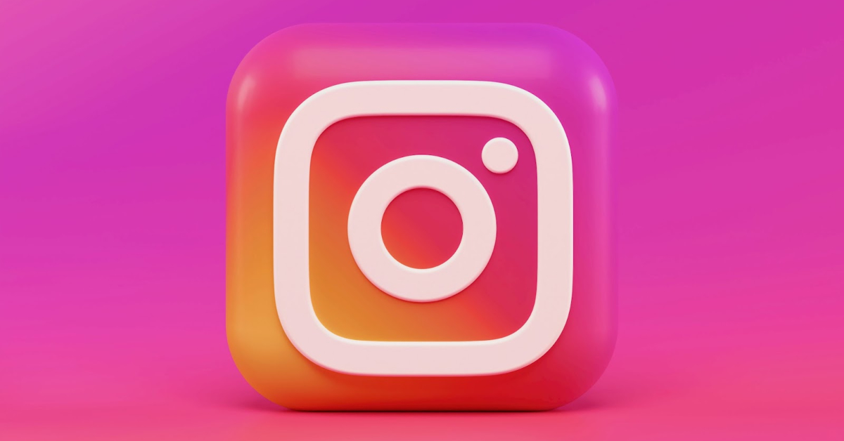 A 3D Instagram logo elegantly floats on a vibrant pink and orange gradient background, embodying the creative potential of visual storytelling.