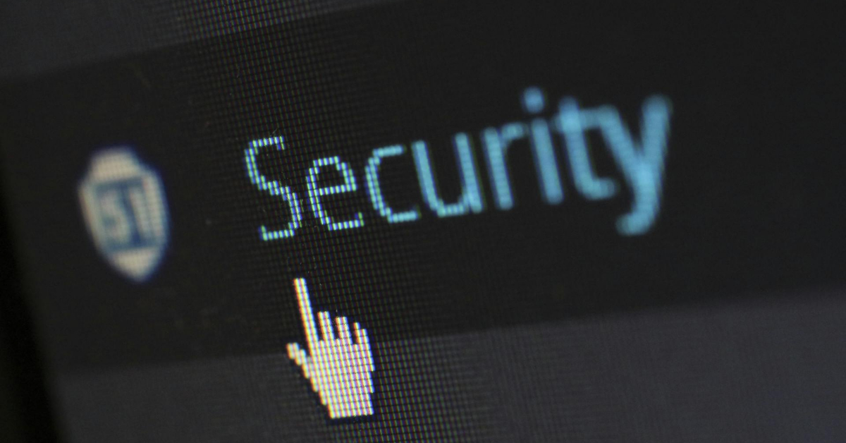 A computer screen displays the word "Security" with a pixelated hand cursor pointing at it, highlighting the importance of data security and how to protect data online.