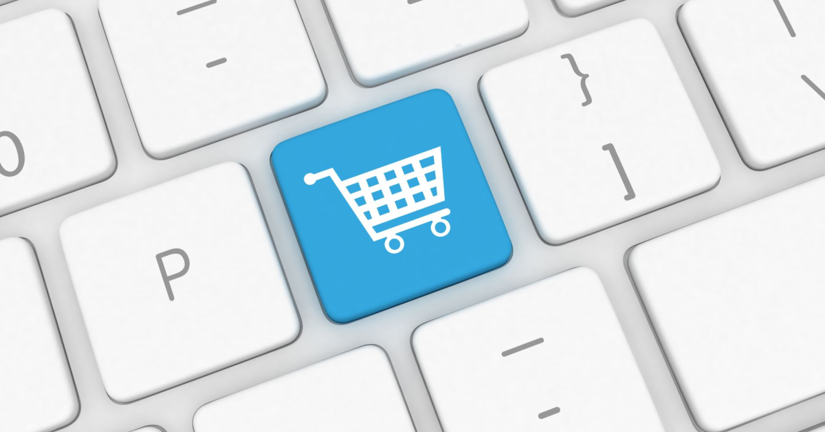 A close-up of a computer keyboard with a blue key featuring a white shopping cart icon highlights the importance of secure online payment processing for e-commerce businesses.