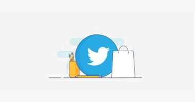A large blue Twitter logo is centered between a yellow cup of pencils and a white shopping bag on a light background, highlighting the connection between Twitter Marketing and E-commerce.