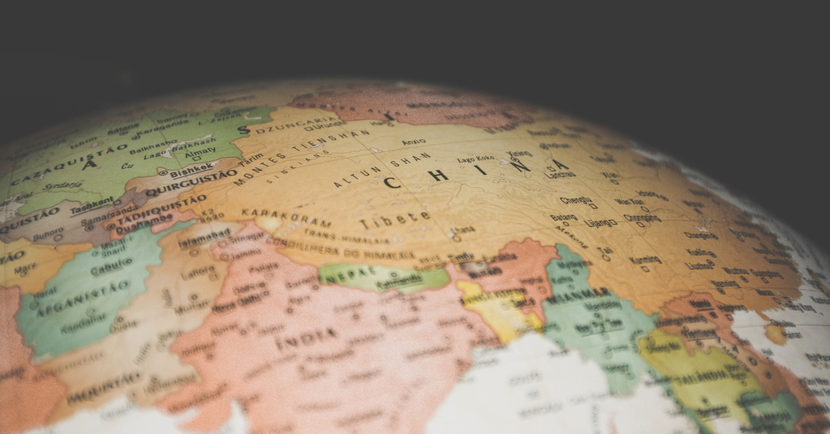 A close-up of a globe showing China and surrounding countries in Asia, including parts of India, Russia, and Mongolia—highlighting regions primed for market expansion and captivating new markets.