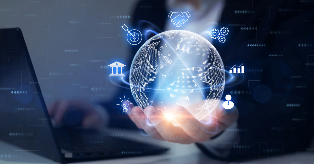 A person holds a glowing digital globe with business and technology icons, highlighting the power of online presence while using a laptop. The scene suggests global connectivity and innovation.