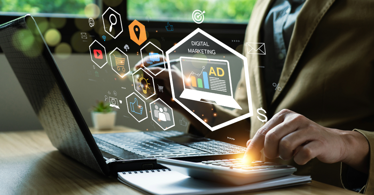 Person using a laptop and calculator with digital marketing icons and graphics overlaid, representing concepts like digital advertising and rich media advertising.