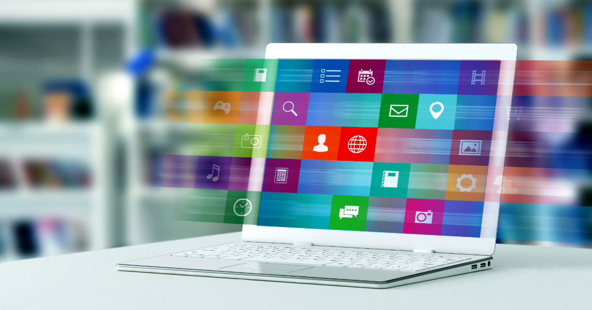 A laptop displaying a colorful grid of app icons on its screen with blurred icons appearing to move outward, suggesting the speed and efficiency of Top Atlassian Apps in delivering leading solutions for digital activity.