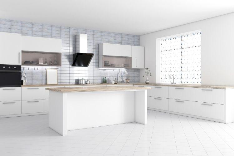 White kitchen interior with stove and range hood
